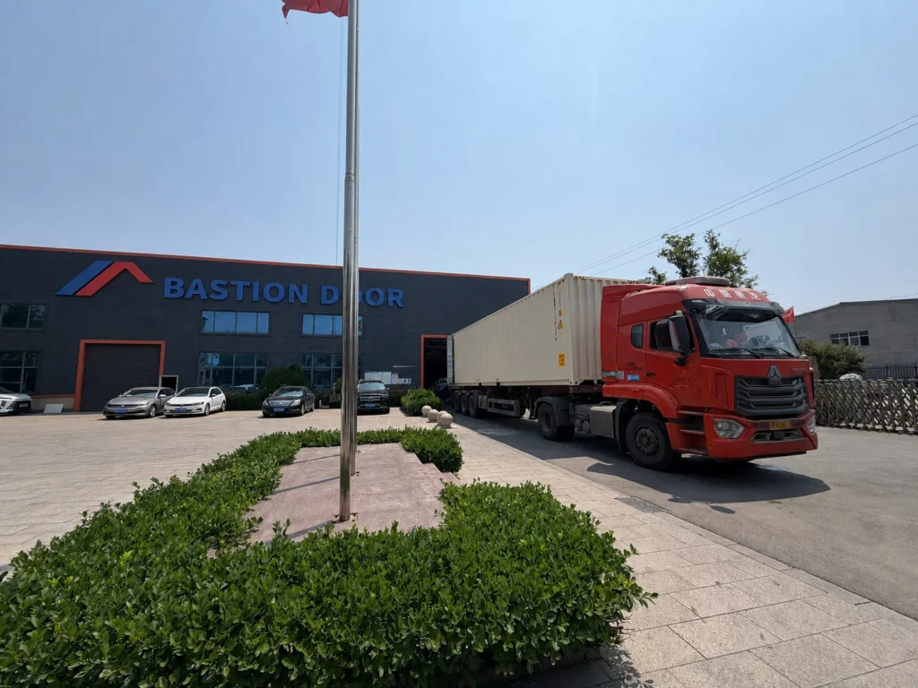 Bastion Door factory with export container truck ready for shipment