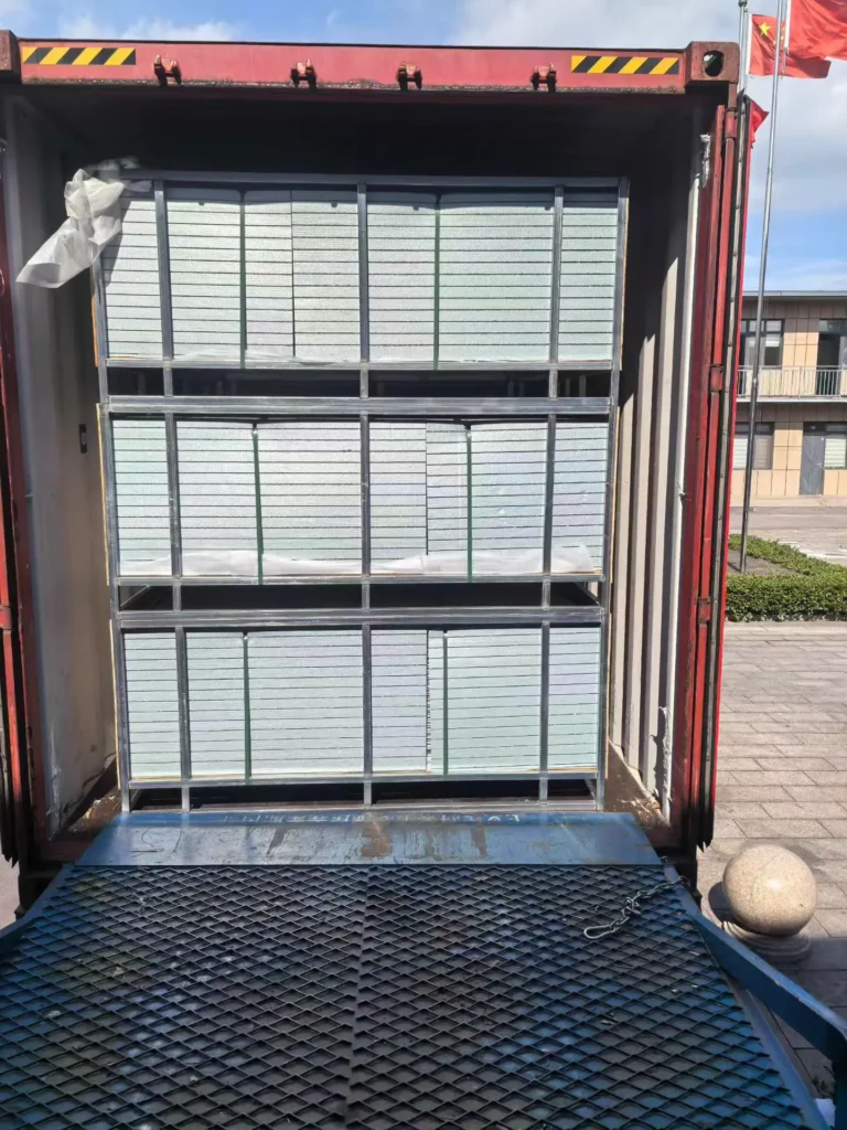 Door leaves secured in a loading rack at the factory