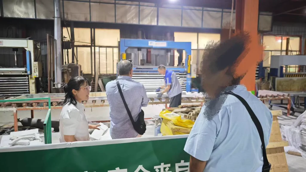Customer visitors touring the Bastion Door production floor